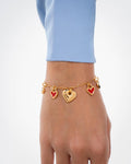Pulsera Multicharms Corazones + Aretes